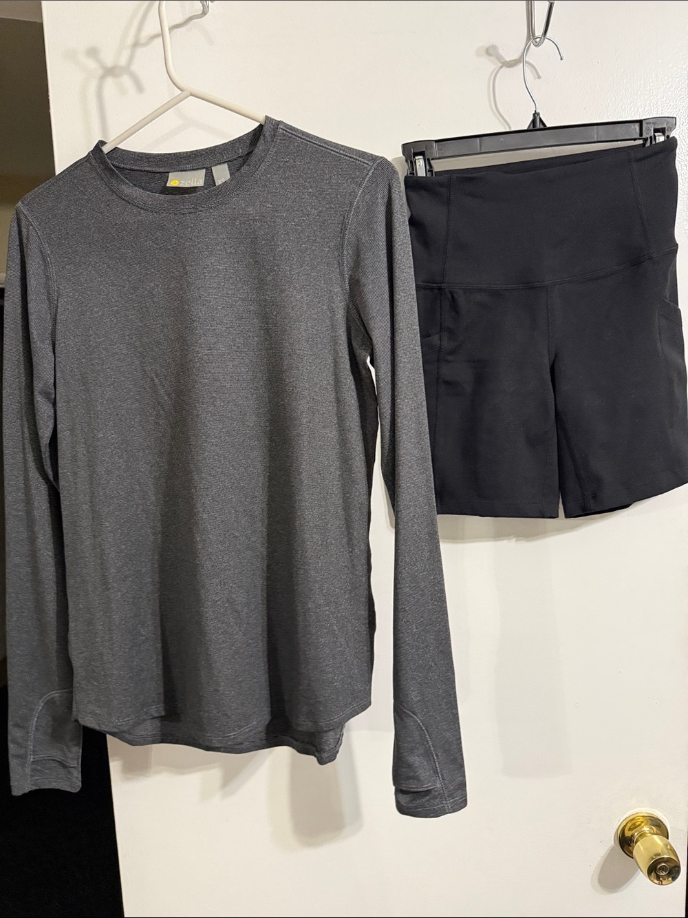 Gray Long Sleeve Athletic Top with Black High-Waist Bike Shorts